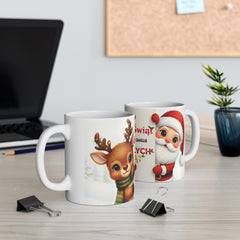 Kubek „Magia Świąt zaczyna się w sercu” – świąteczny kubek z Mikołajem i reniferem | Prezent na Święta | Biały ceramiczny kubek na kawę i herbatę